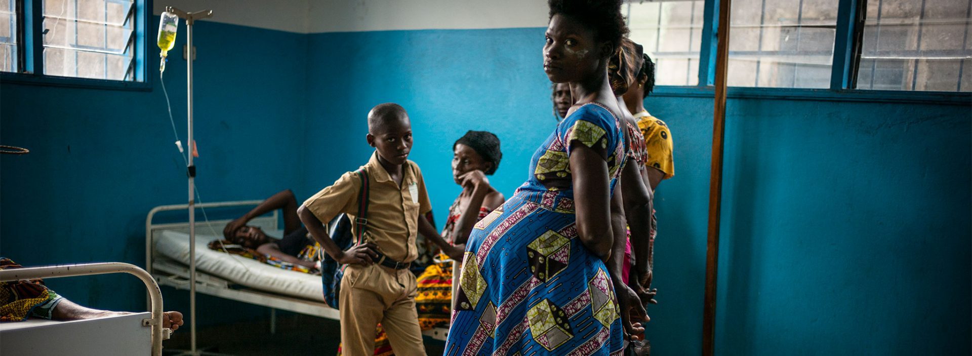 Pregnant lady looking to camera in Cote D'Ivoire