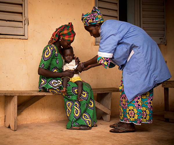 A boy is screened for malnutrition at an Action Against Hunger treatment centre in Mali.