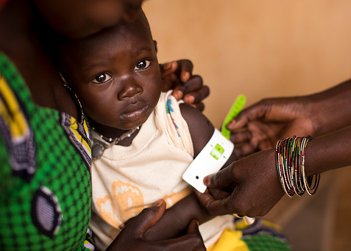 A child being screened for malnutrition at an Action Against Hunger health centre in Mali.