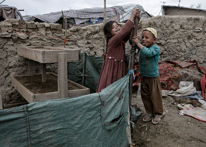 Two children playing in Afghanistan.