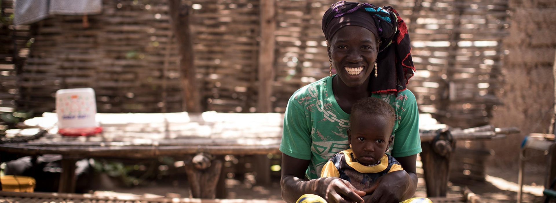 A woman and her child in Mali. They've been supported by Action Against Hunger's community health workers.