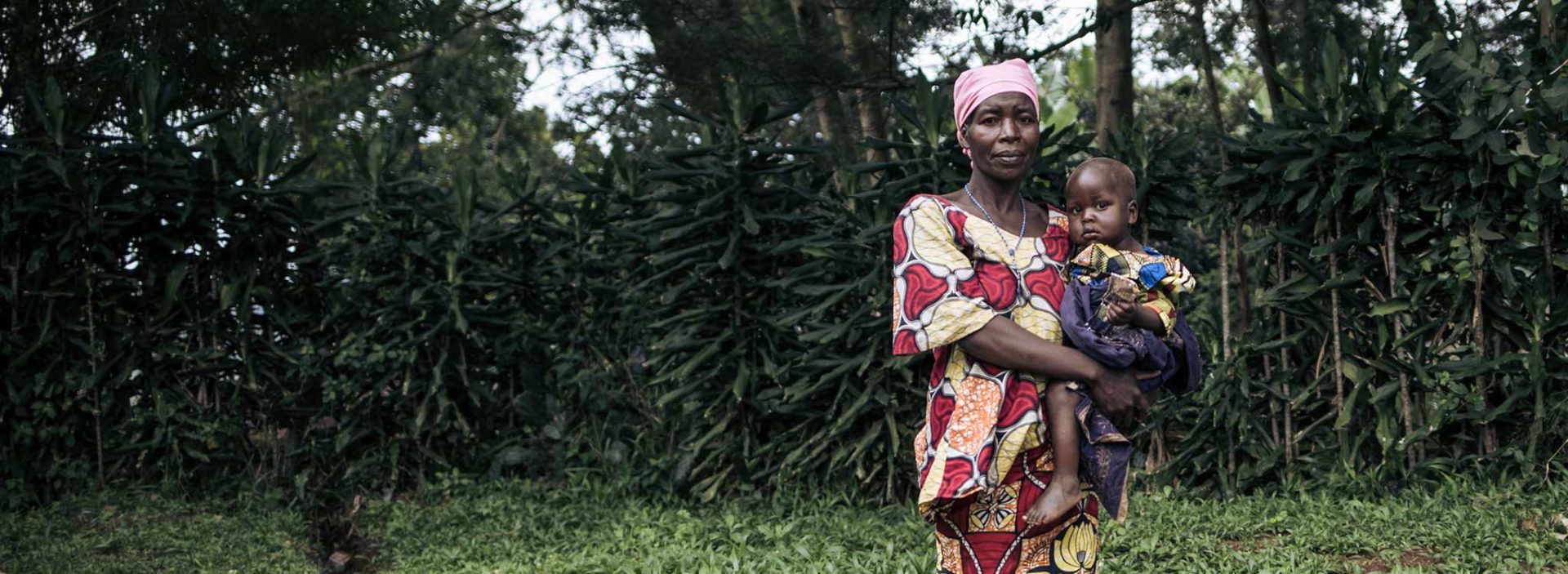 A woman and a child at an Action Against Hunger project in Democratic Republic of Congo.