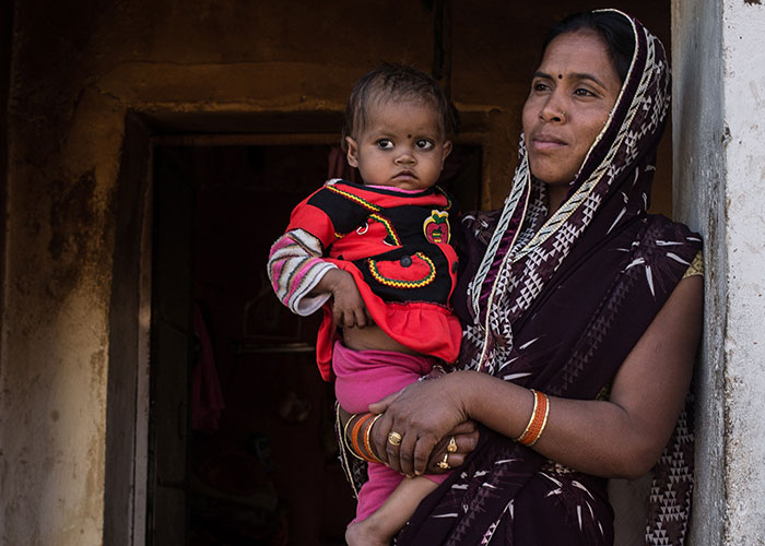 Sunita and Bhumika at home after receiving treatment from Action Against Hunger.