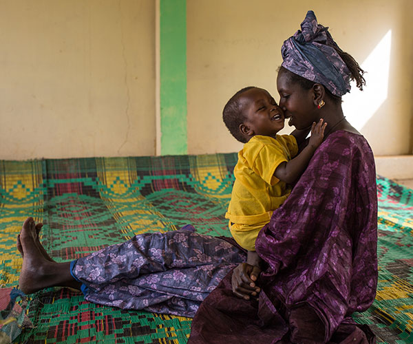 Ousmane and his mum at an Action Against Hunger project in Mauritania.