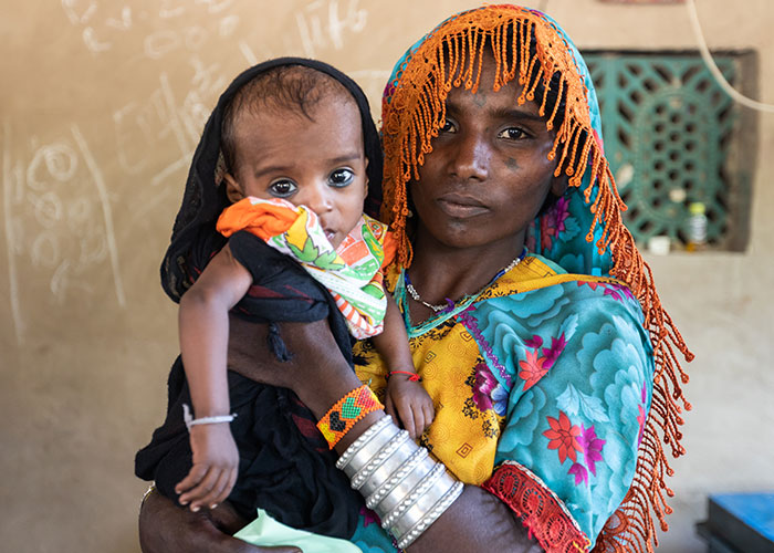A woman and her child at an Action Against Hunger project in Sindh province, Pakistan.