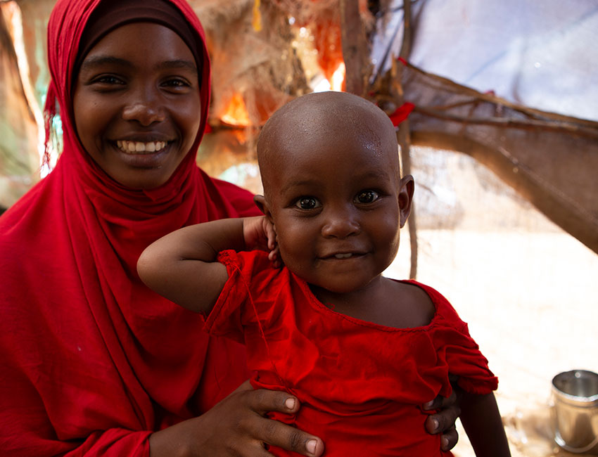 Halima and her mum Fatuma. Action Against Hunger helped Halima recover from malnutrition.
