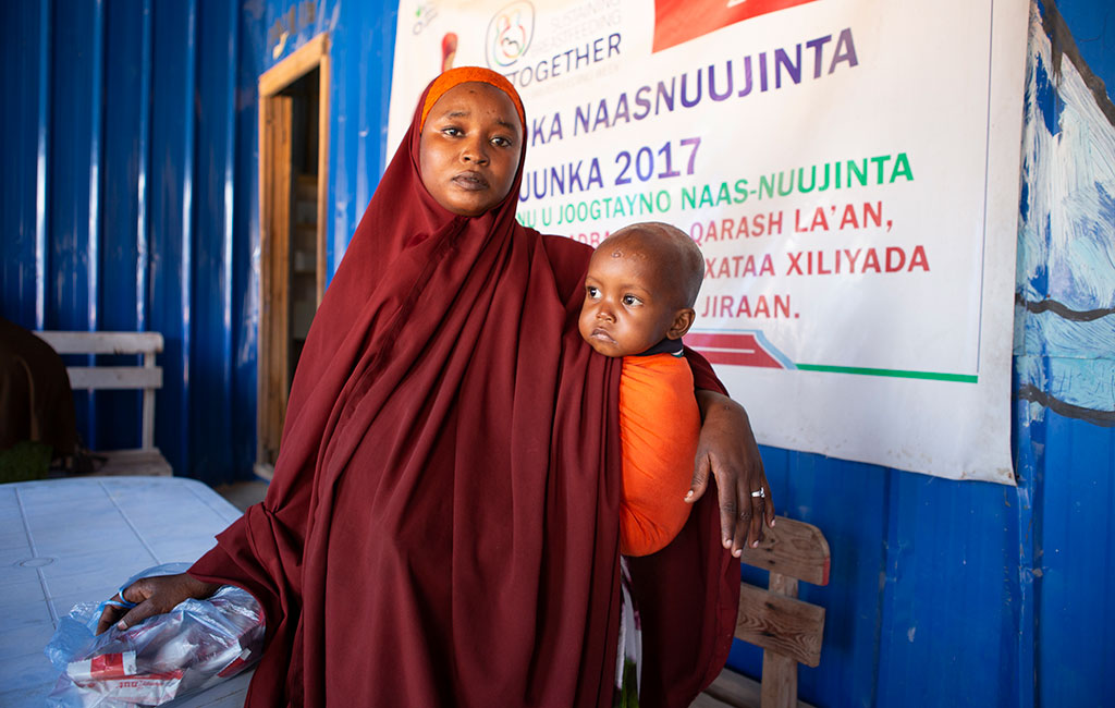 Mohamed with his mum Hafsa at an Action Against Hunger treatment centre in Mogadishu, Somalia.