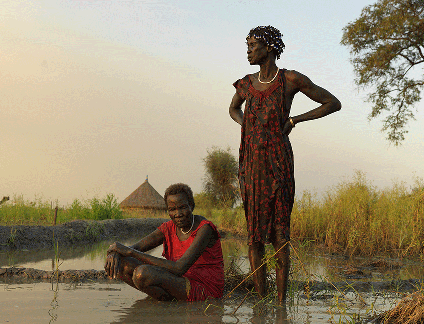 Nyakoang Mayieh, 70, and Nyayen Chuol, 60, from South Sudan after they tried in vain to remove the flood waters from their home. Their future now looks bleak.