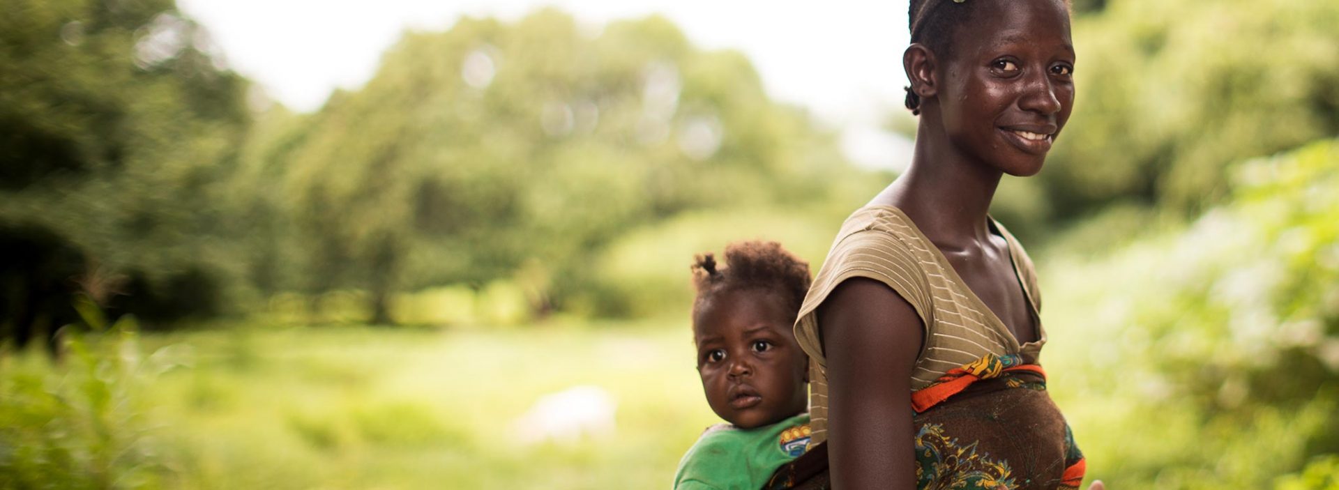 A woman and her child in Mali. They've been supported by Action Against Hunger's community health workers.