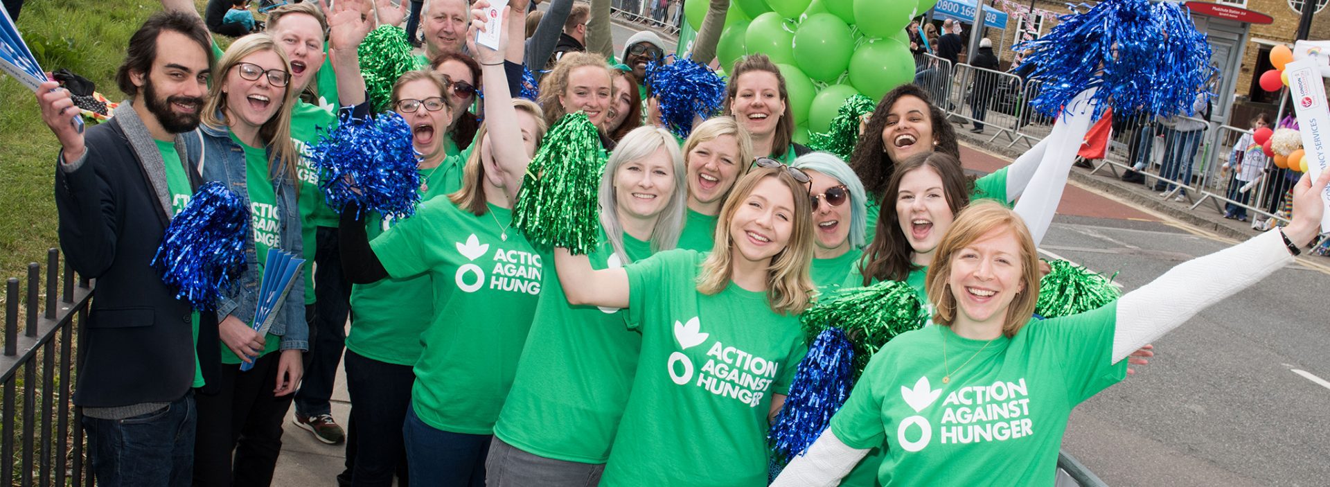 Action Against Hunger staff support runners at the London Marathon.