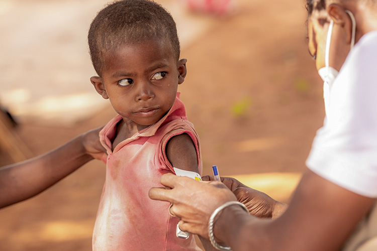 A boy is screened for malnutrition at an Action Against Hunger treatment centre in Madagascar.