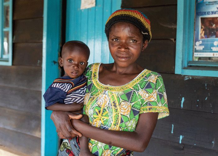 Anne-Marie Mukesha Manizabayo with her son, Fiston Irampaye (8 months), at the Mokoto health center in the DRC. Action Against Hunger is preparing to provide her with RUTF to combat her son's undernutrition.