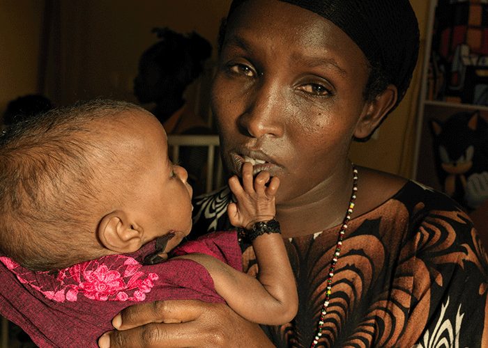 Safiya, 33, with her severely malnourished daughter Fardosa who is 11 months old at Yabelo General Hospital