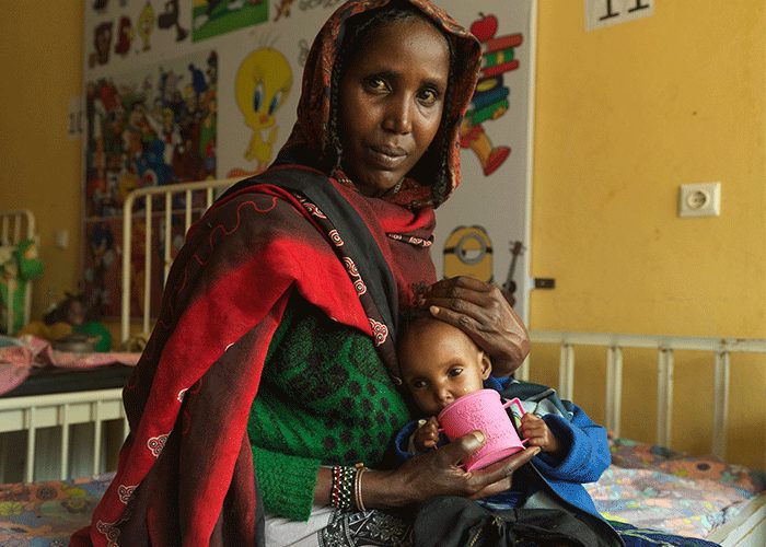 Kebele and her baby Dabo after a screening at the Stabilisation Centre at Yabelo General Hospital, Ethiopia