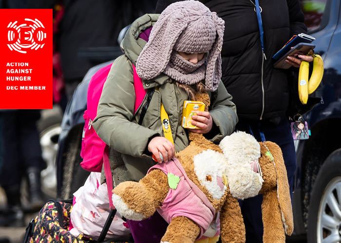 A girl fleeing the conflict in Ukraine. DEC member charities are ready to respond.