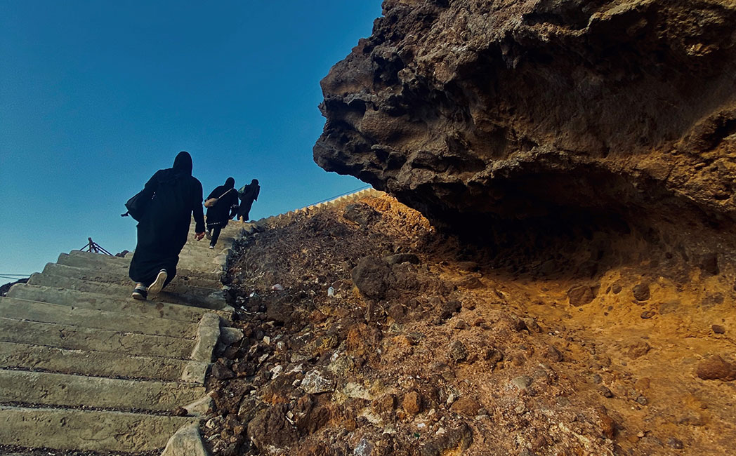 Nada and her friends climb the stairs of Alburyqa Castle.