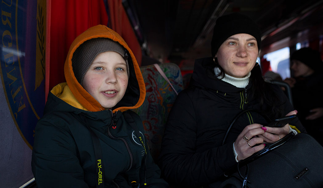 Ukrainian refugees arrive by bus to Palanca, Moldova.