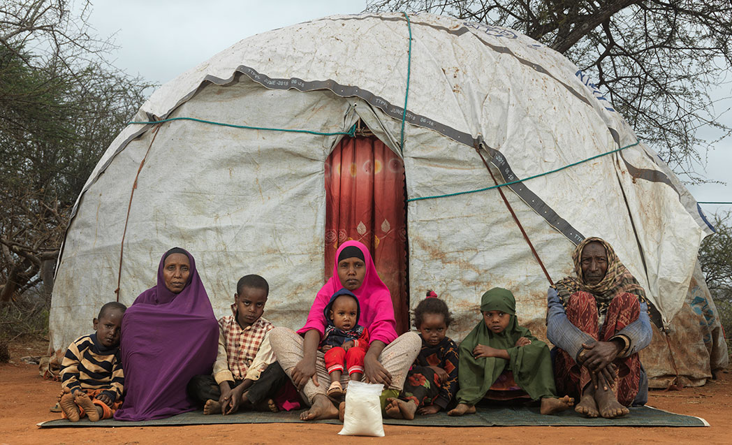 Abdiya and her family in Ethiopia. They have one bag of sorghum to feed themselves every day. 