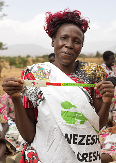 Rose, an Action Against Hunger member of staff in Kenya, with a MUAC band.