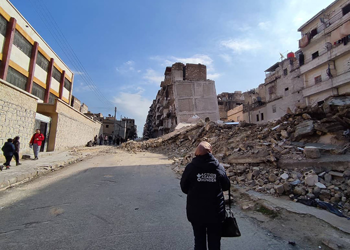An Action Against Hunger staff member analyses the damage after the earthquake in Syria.