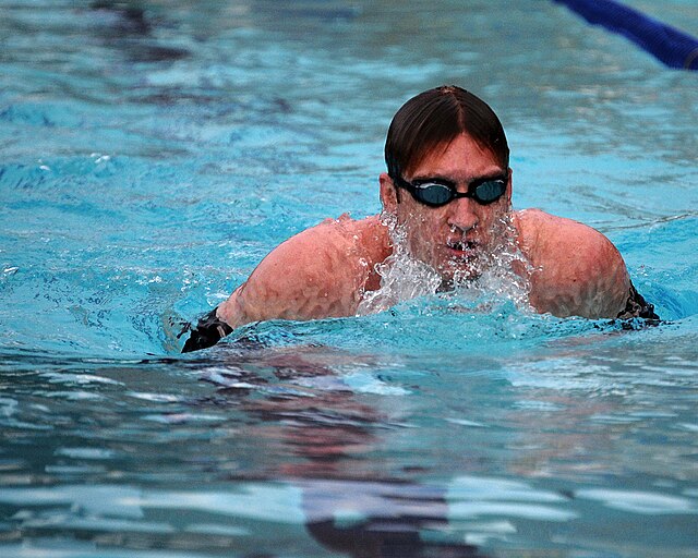 Man swimming in a pool