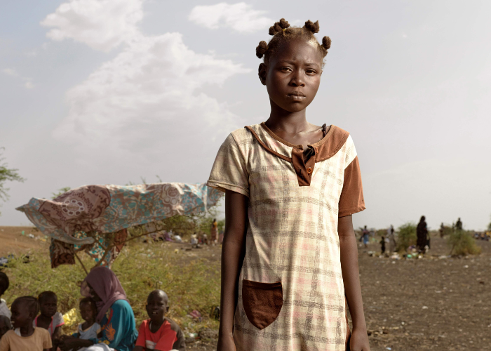 A girl in Sudan looking at the camera.