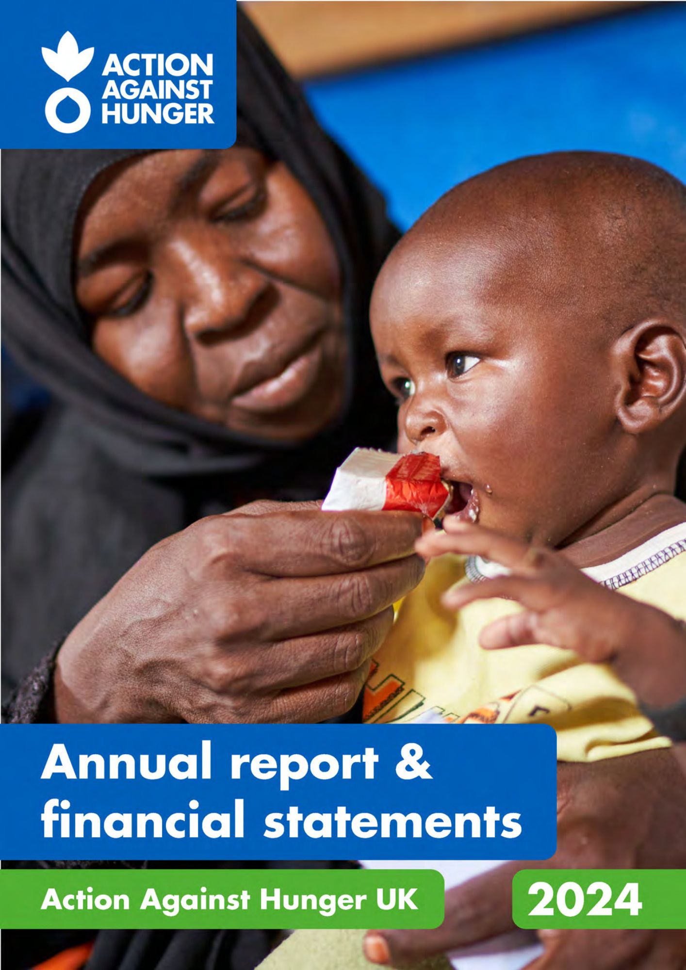 Woman feeding her child in Sudan.
