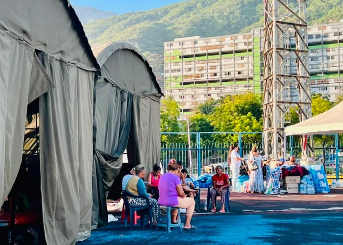 Venezuelan communities outside emergency shelter.