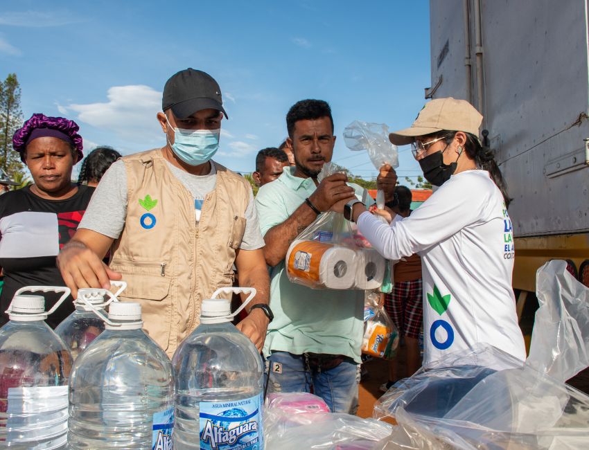 Action Against Hunger staff distribute hygiene kits in Playa Grande, Venezuela.