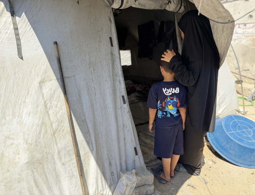 A mother and her child in a displacement camp in North Gaza.